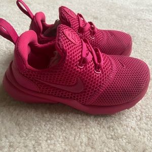 Girls adorable pink Nike tennis shoes